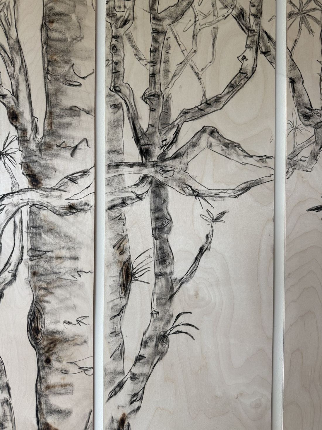 Tree panel — fire and charcoal on wood